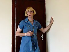 The blonde sissy in a denim dress spends lots of time chatting with the camera in his solo s...