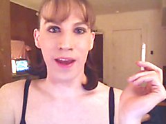 This smoking fetish video features a sexy, confident femme fatale who tantalizes viewers wit...