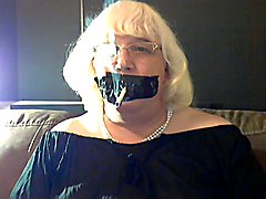 Smoking with tape gag Tape gags are a type of bondage in which a person`s mouth is sealed wi...
