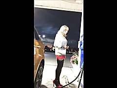At a gas station in a short short mini skirt At the Gas Station, a woman stood out with her ...