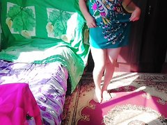 This amateurish CD video features a green mini house dress-clad t-girl CD with a enormous bo...