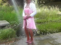 A mature sissy in high heels, stockings, and satin crossdressing and using anal toys to plea...